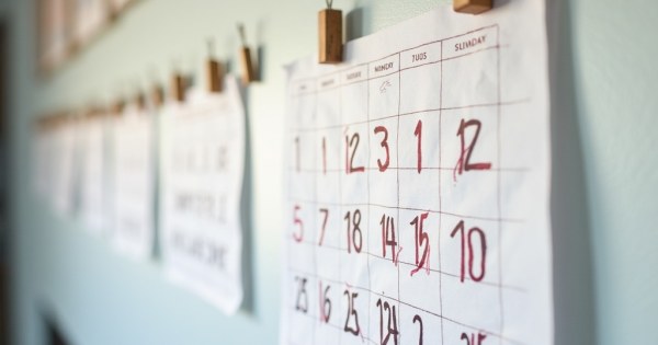 A calendar on a wall with days crossed off one by one